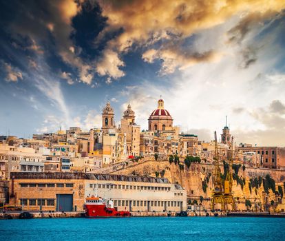 view on Senglea fort in Malta from sea at sunset