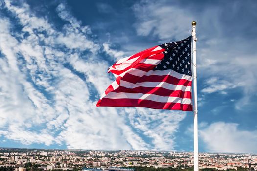 american flag waving in the sky