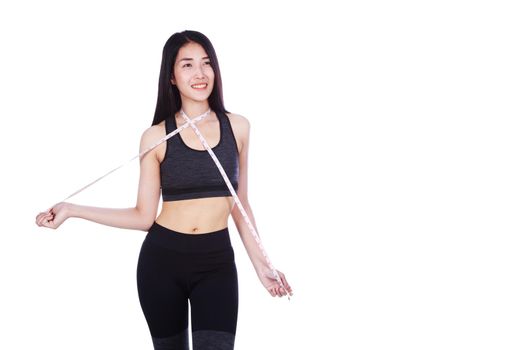 fitness woman with tape measure around her neck isolated on a white background