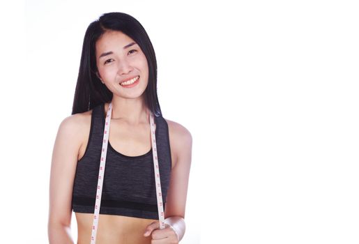 fitness woman with tape measure around her neck isolated on a white background