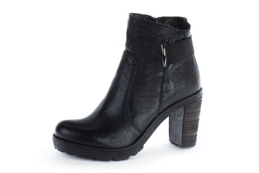 Female autumn-winter leather ankle boots isolated on white background