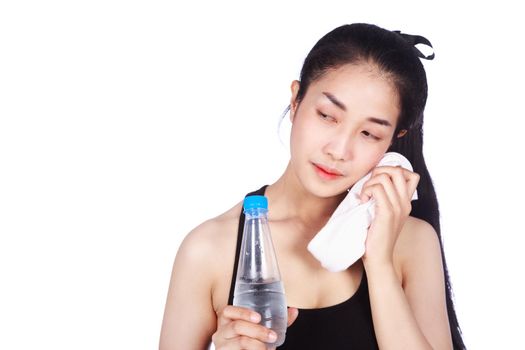 sporty woman with towel and water bottle isolated on a white background