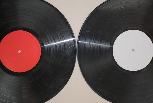 vinyl record on beige background.