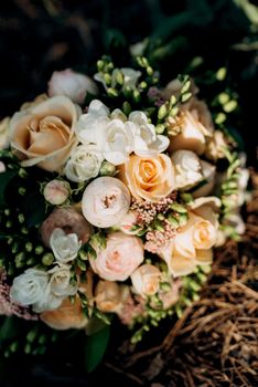 elegant wedding bouquet of fresh natural flowers and greenery