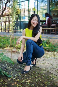 portrait of beautiful asian woman in the garden