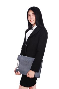 smiling business woman in suit holding a clipboard isolated on a white background