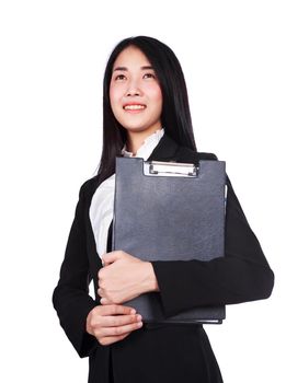 smiling business woman in suit holding a clipboard isolated on a white background