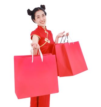 happy woman holding shopping bag on chinese new year celebration isolated on white background