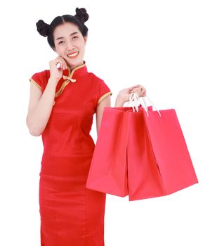 happy woman holding shopping bag on chinese new year celebration isolated on a white background