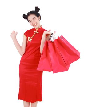 happy woman holding shopping bag on chinese new year celebration isolated on white background