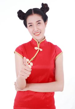 beautiful woman wear red cheongsam and thumb up in concept of happy chinese new year