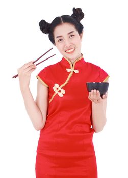 happy woman wearing chinese cheongsam dress with chopsticks and bowl isolated on a white background