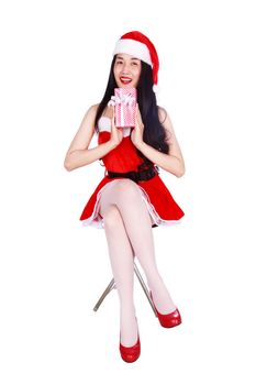 happy woman in Santa Claus clothes with gift box isolated on a white background