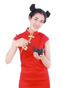 happy woman wearing chinese cheongsam dress with chopsticks and bowl isolated on a white background