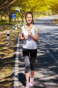 fitness woman running in the park