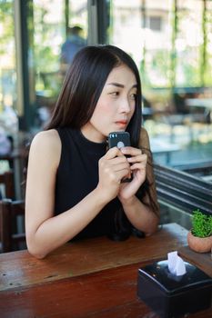 portrait of beautiful woman resting in the cafe