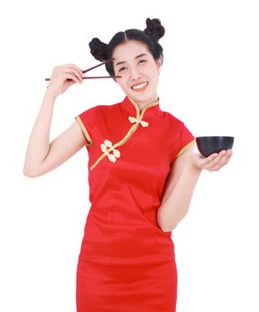 happy woman wearing chinese cheongsam dress with chopsticks and bowl isolated on a white background