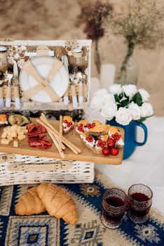 picnic in nature with a basket of delicious products