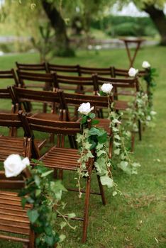 wedding ceremony area with dried flowers in a meadow in a green forest