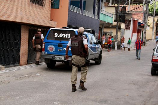 salvador, bahia, brazil - noovember 21, 2012: Military Police agents are seen during police operation in the Pernambues neighborhood in the city of Salvador.