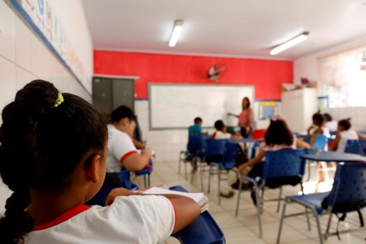 lauro de freitas, bahia, brazil - august 21, 2019: public school students are seen in a classroom in the city of lauro de Freitas.