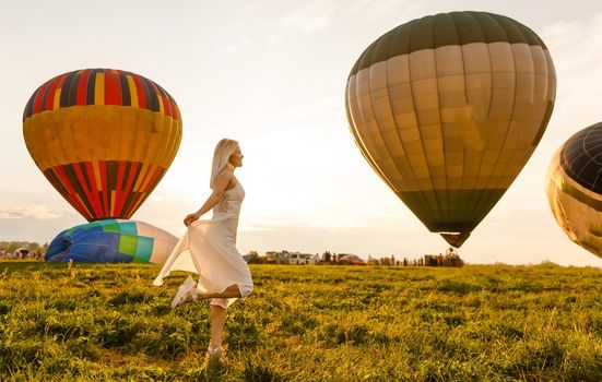 woman and a hot air balloon, summer