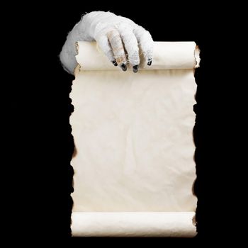 Mummy in hands keeps vertical manuscript on dark background. Space for text.