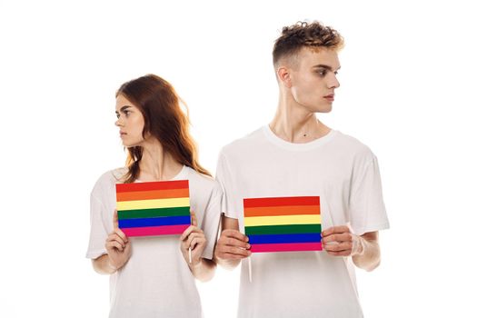 young couple lgbt Flag transgender lifestyle light background. High quality photo