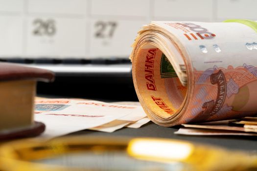 Magnifying Glass on the Russian Currency Rubles. High quality photo
