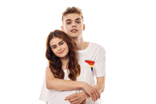 young couple lgbt Flag transgender community light background. High quality photo