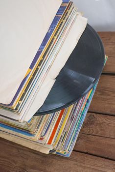 a bunch of old vinyl records. Retro music recording.