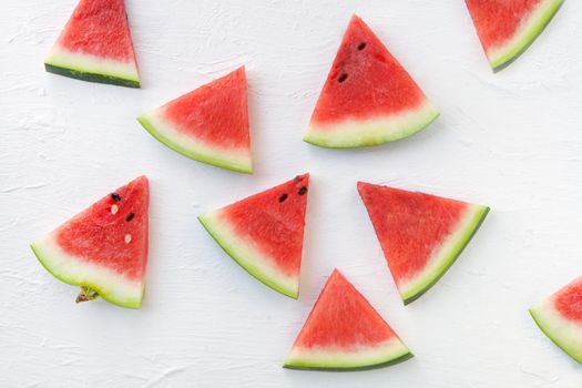 Watermelon pattern. Sliced watermelon on white background. Flat lay, top view. watermelon slices on white