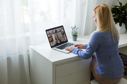 Conference room with video conference equipment and laptop