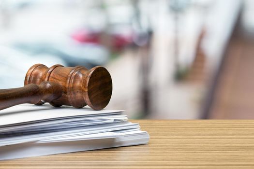 Wooden gavel on table close up. Justice concept