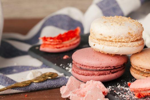 Close up colorful macarons dessert with vintage pastel tones