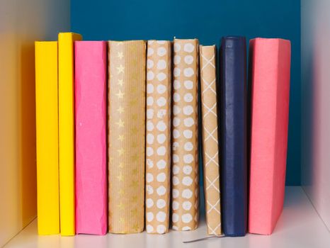 books on a wooden shelf at home or office