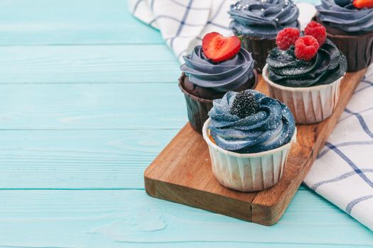 delicious cupcakes on a colored background. Festive background, birthday