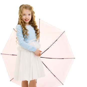 A beautiful little girl hid under an umbrella. The concept of summer vacation, style and fashion. Isolated on white background.