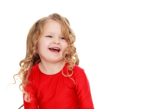 Beautiful, chubby little girl with long, blond,curly hair.Girl dancing in a bright red dress.Isolated on white background.