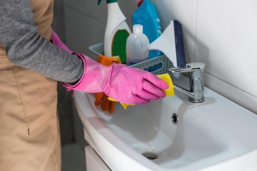 beautiful young cleaner cleaning office.