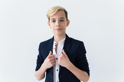 Teenage boy portrait on a white background.