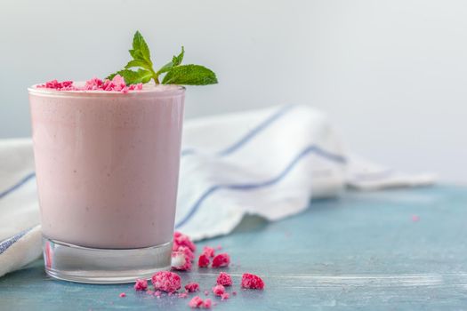 Close up of fruit yougurt smoothie - health living concept