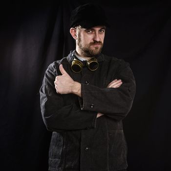 young beard worker welder going thumb up