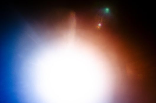 Abstract Natural Sun flare or Far star on the black background - image