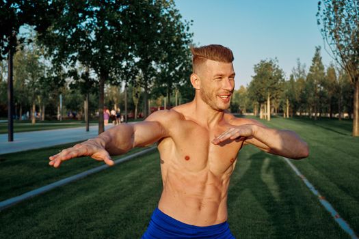 sports car pumped up cardio workout in the park. High quality photo