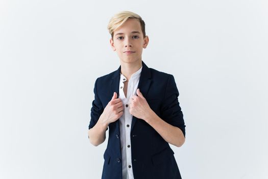 Teenage boy portrait on a white background.