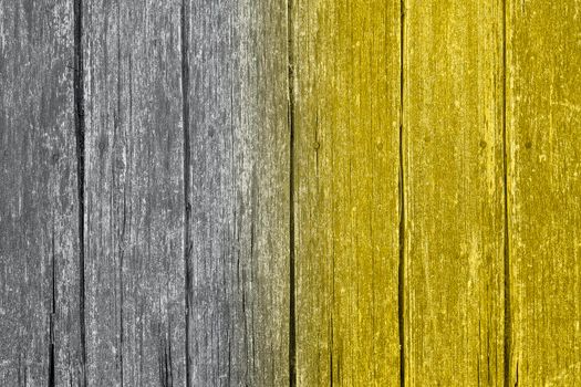 Gradient Ultimate Gray and Illuminating yellow wooden surface toned in trendy colors of 2021. Wood background