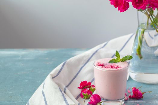 Close up of fruit yougurt smoothie - health living concept