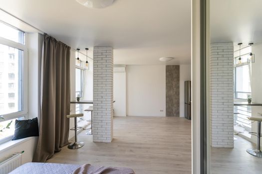 Kitchen and living room of loft apartment