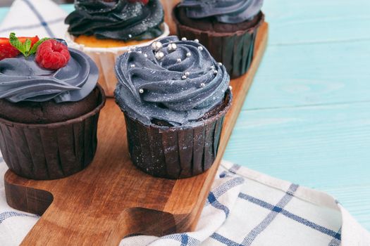 delicious cupcakes on a colored background. Festive background, birthday